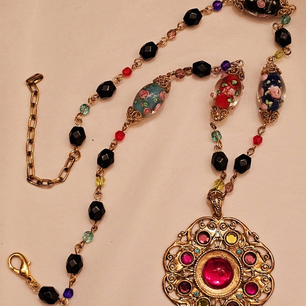 Ornate vintage gold-toned pendant necklace; glass & crystal beaded chain